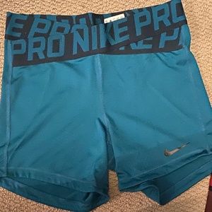 Nike Pro Crossover waistband 5” inseam compression shorts. Multiple colors.